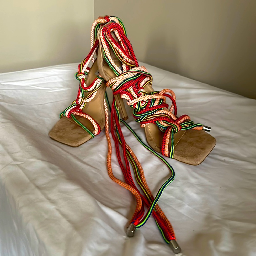 New Unworn lace up heal beauties.